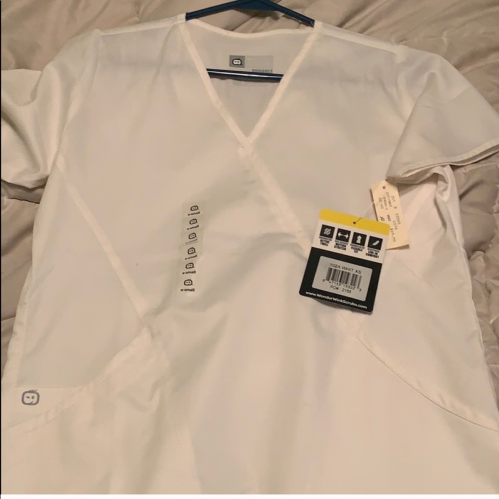 White scrub, size s but can possibly fit a m